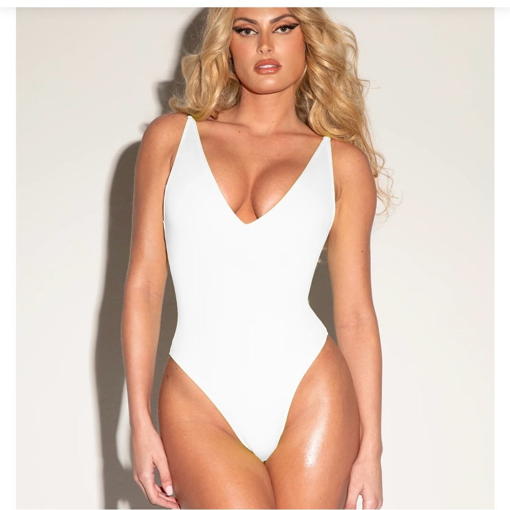 T3 high cut plunge one piece NWT